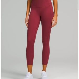 Lululemon Fast & Free high rise tight in a burgundy color. Barely worn. Size 6.